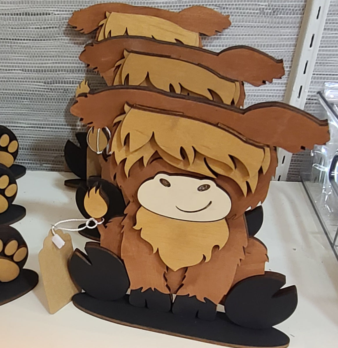 Wood Standing Bear and Highland Cow