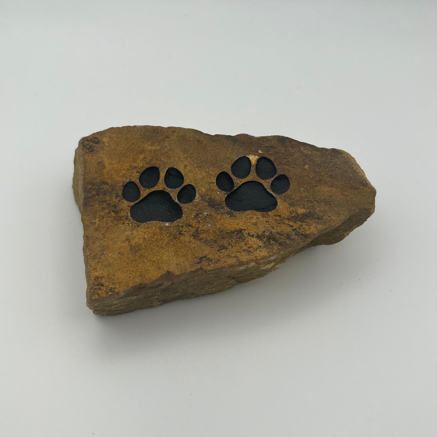 Carved & Painted Double Paw Print Rock