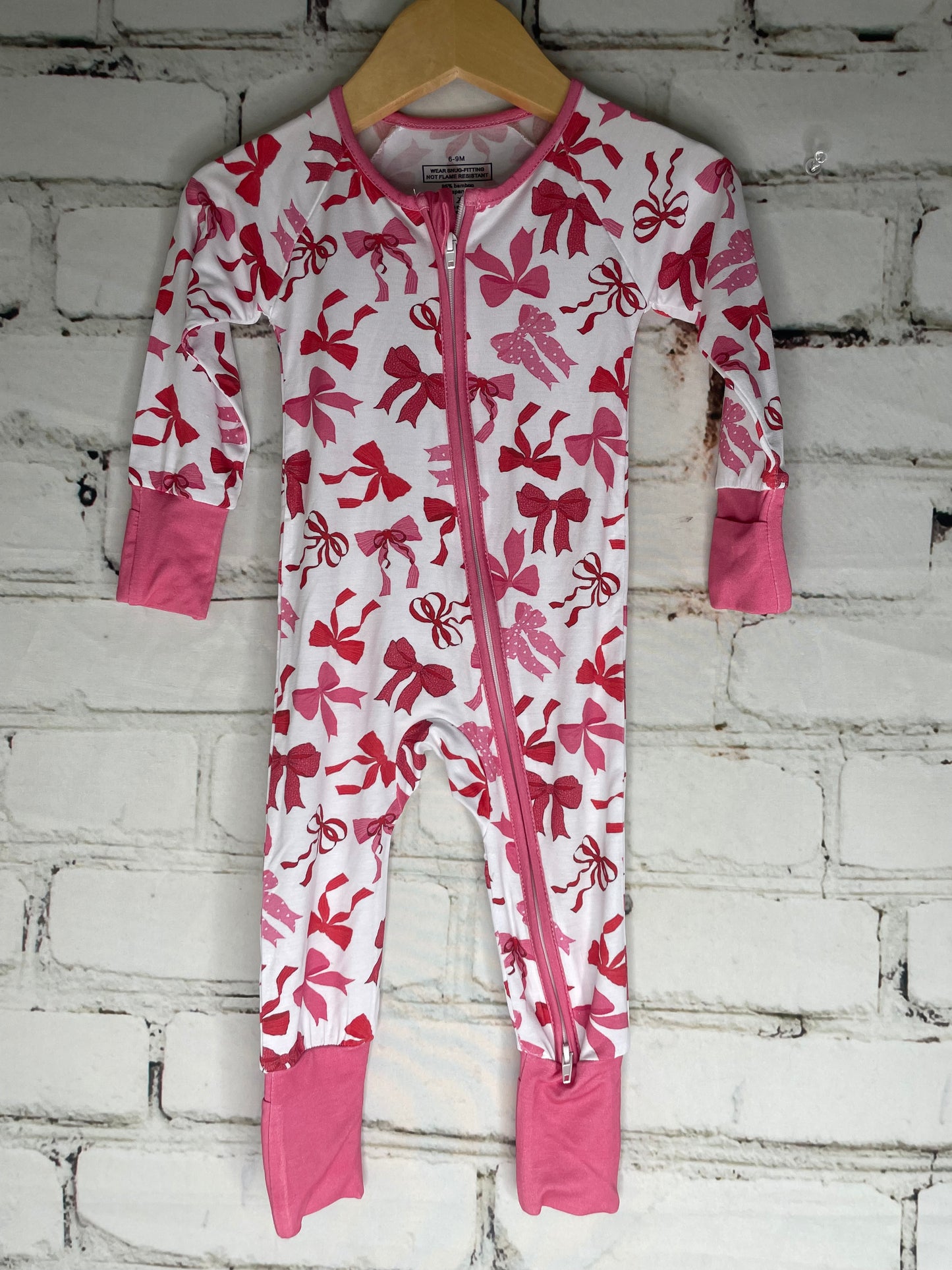 Lover Bows Onesie