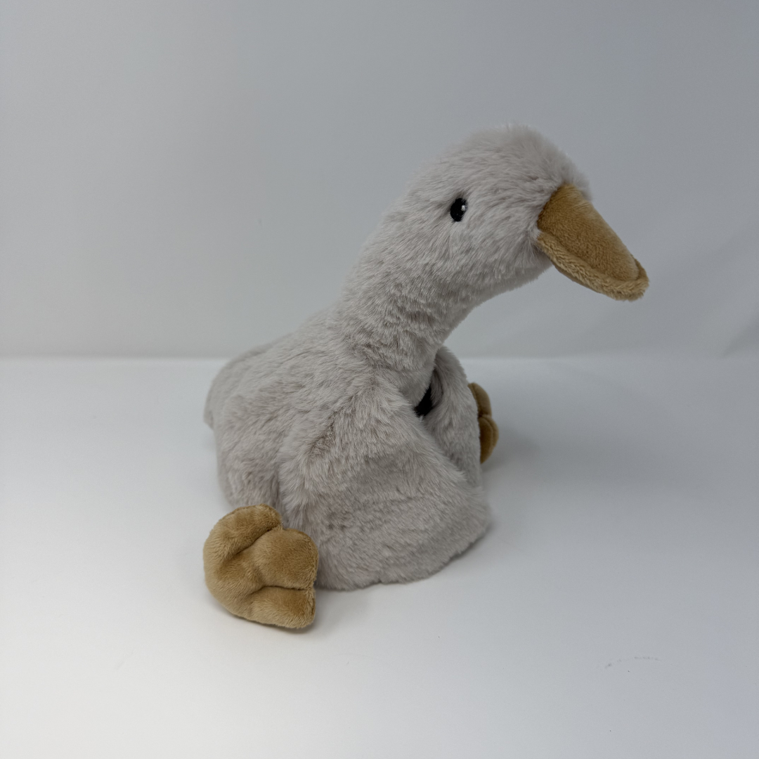Plush-stuffed sitting goose