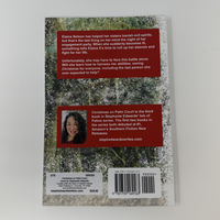 Book back cover with text and a barcode on a gray background