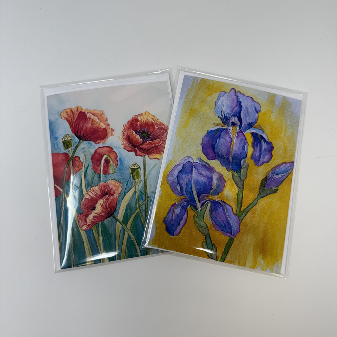Two floral greeting cards with poppies and irises on a white background