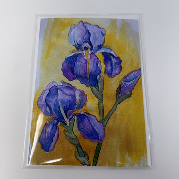 Card with purple flowers on a yellow background