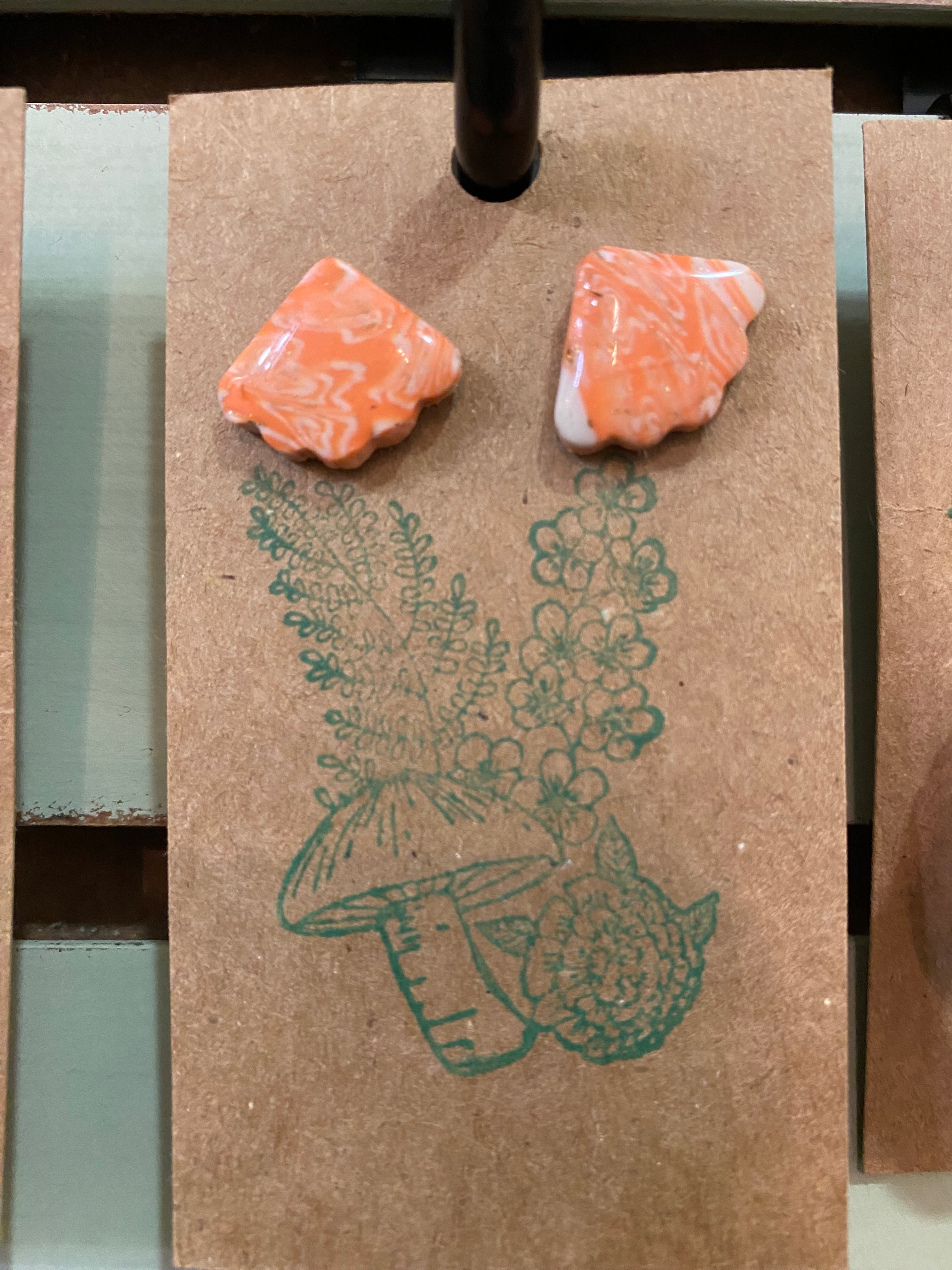 Orange and white shell earrings